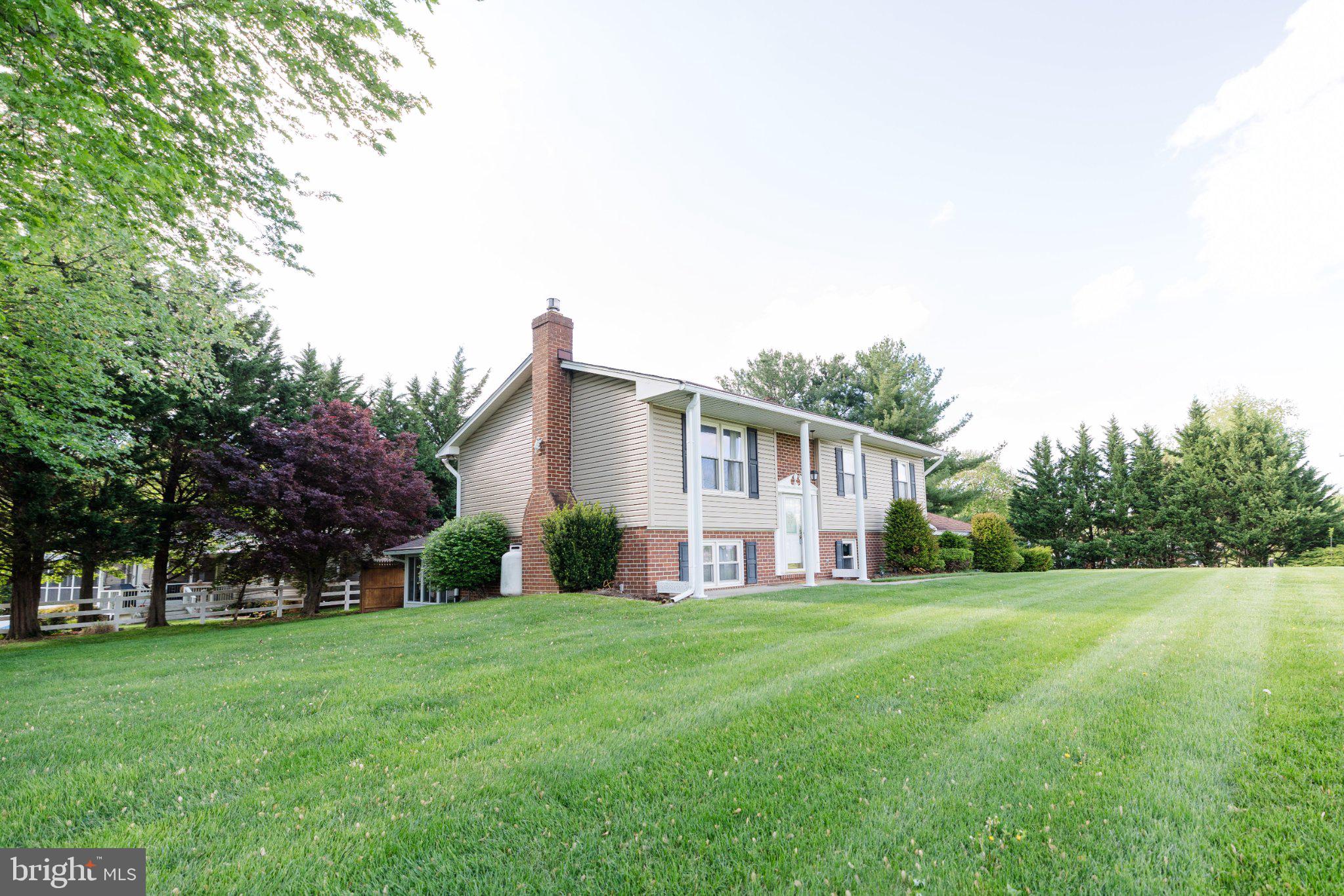 11307 Treeview Lane Monrovia, MD 21770 - Photo 63 of 63 a front view of house with yard and green space