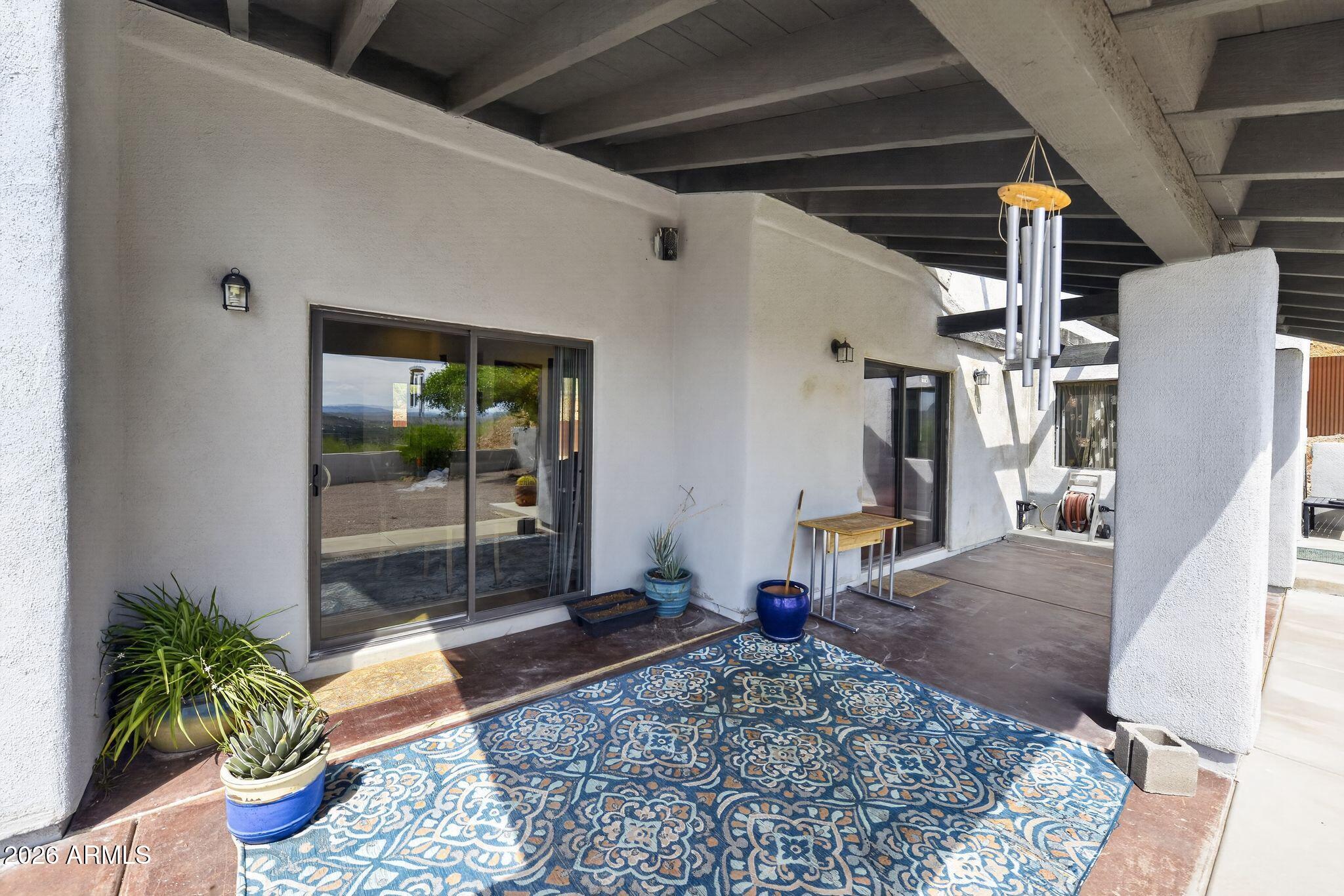 277 Círculo Silva Rio Rico, AZ 85648 - Photo 7 of 34 a living room with furniture and a potted plant