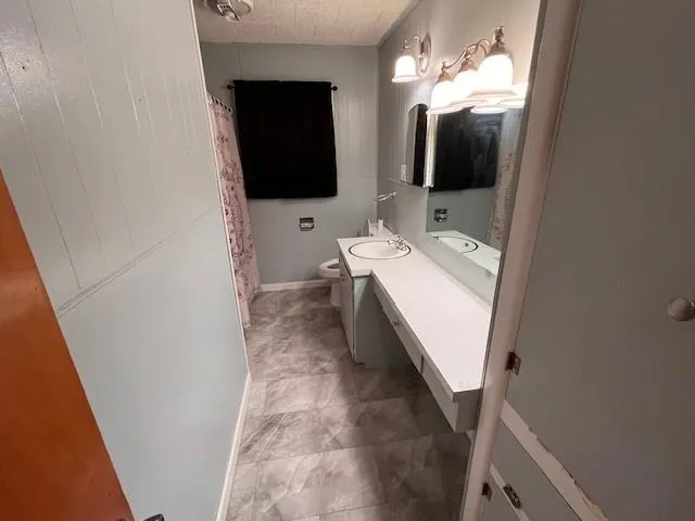 a bathroom with a tub and shower