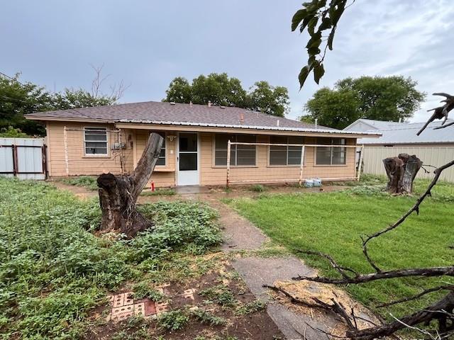 136 Northwest Ave F Hamlin, TX 79520 - Photo 20 of 27 a house view with a backyard space