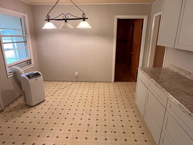 136 Northwest Ave F Hamlin, TX 79520 - Photo 7 of 27 a bathroom with a granite countertop sink a mirror and shower