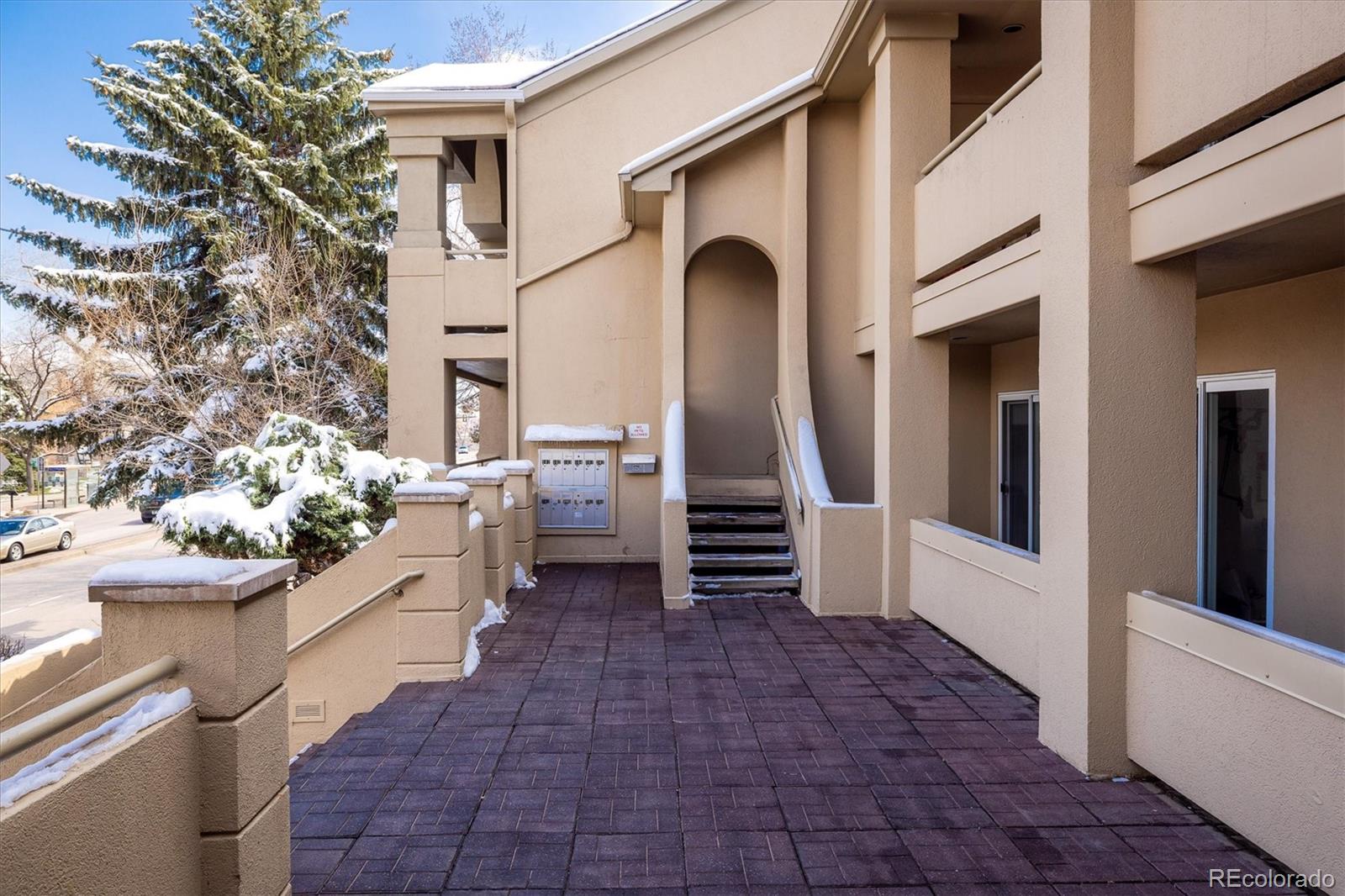 935 Broadway, Unit 104 Boulder, CO 80302 - Photo 21 of 30 a view of a pathway along the building