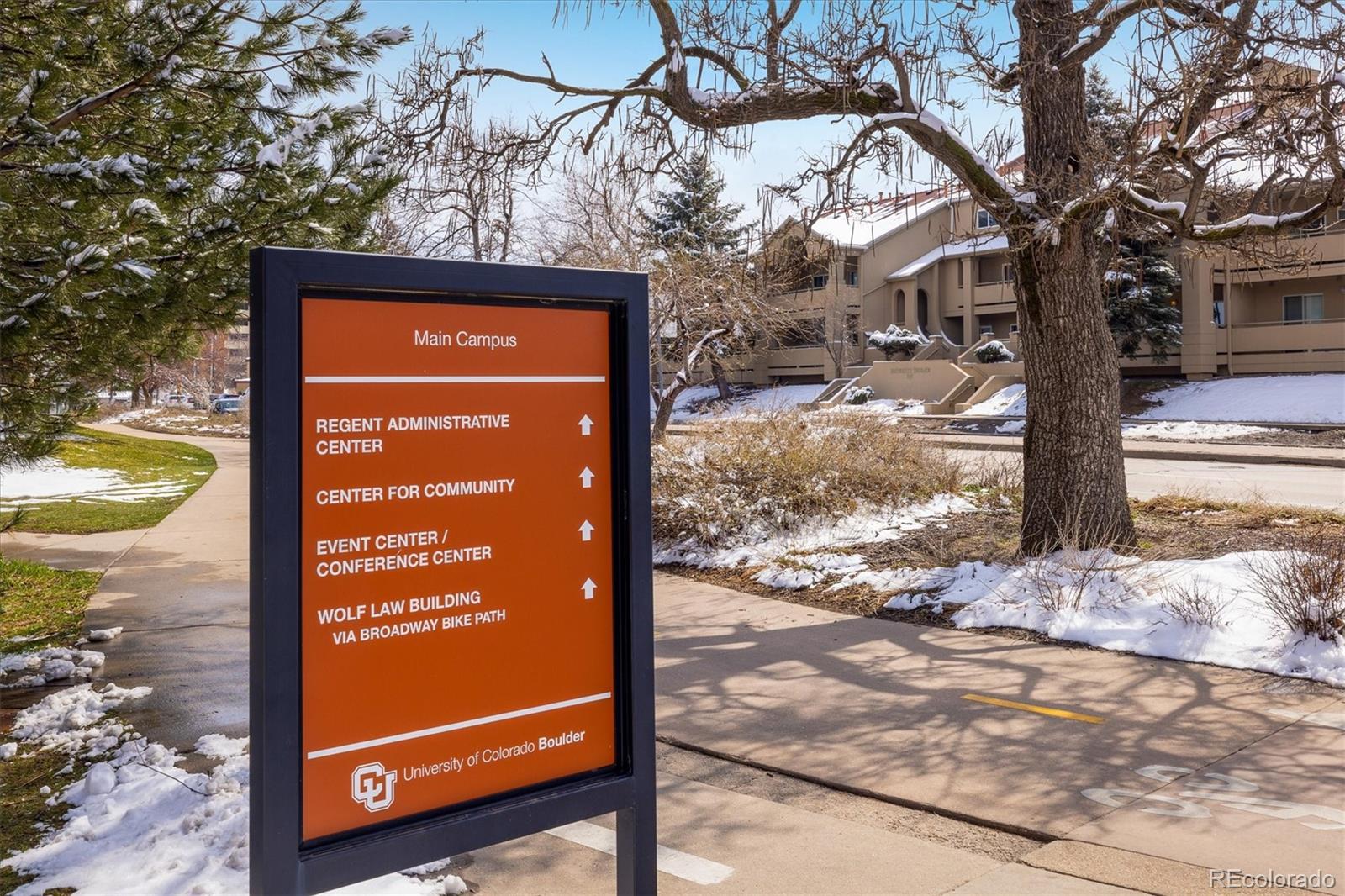 935 Broadway, Unit 104 Boulder, CO 80302 - Photo 24 of 30 a view of a door with a tree