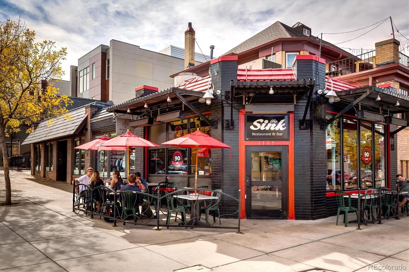 935 Broadway, Unit 104 Boulder, CO 80302 - Photo 29 of 30 a store with outdoor seating area