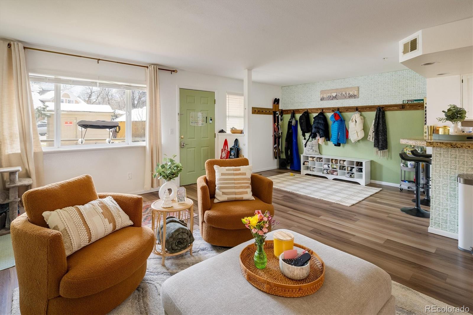 935 Broadway, Unit 104 Boulder, CO 80302 - Photo 4 of 30 a bedroom with furniture and a large window