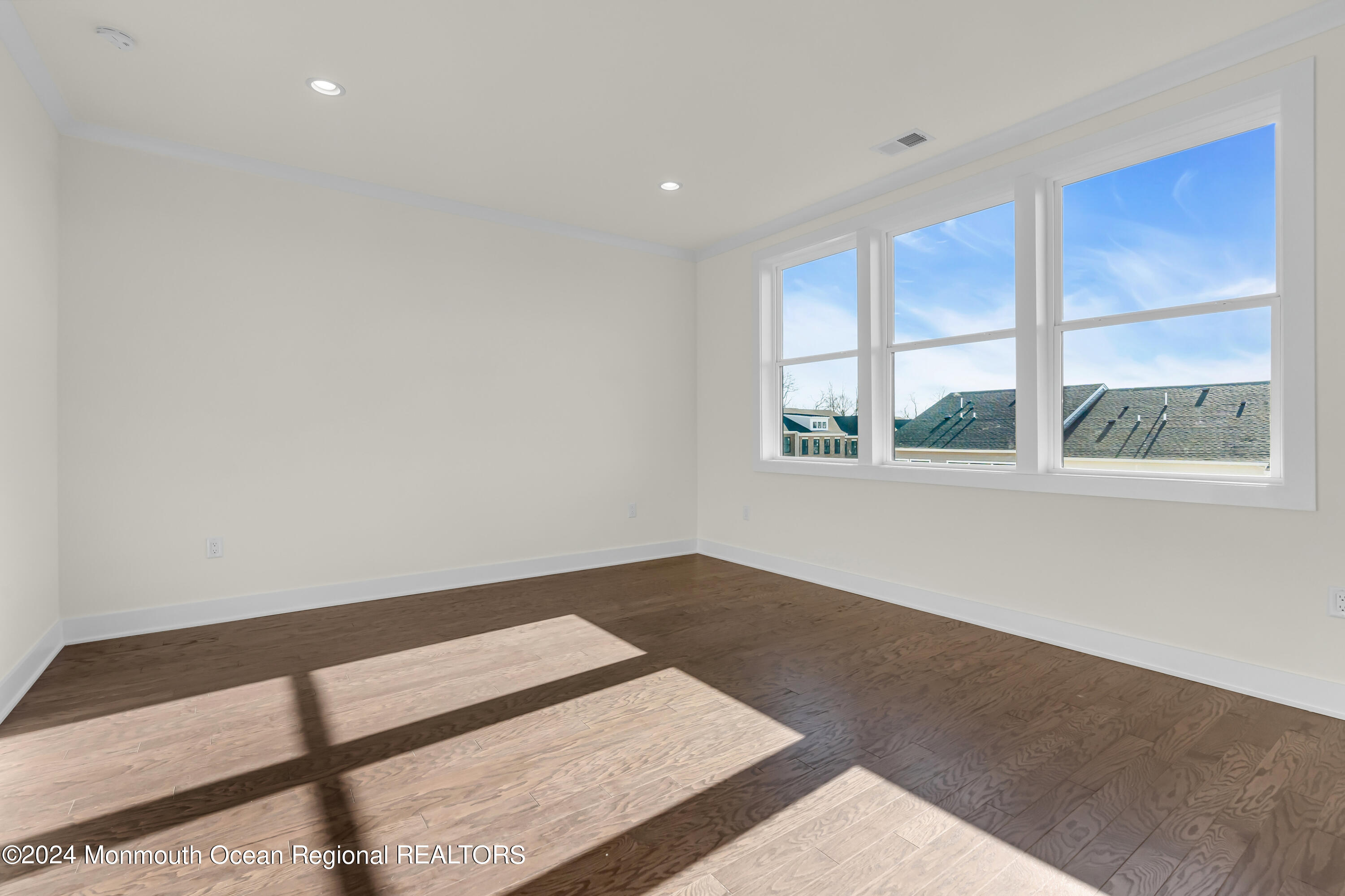 6 Augustus Drive Middletown, NJ 07748 - Photo 21 of 28 a view of an empty room with a window