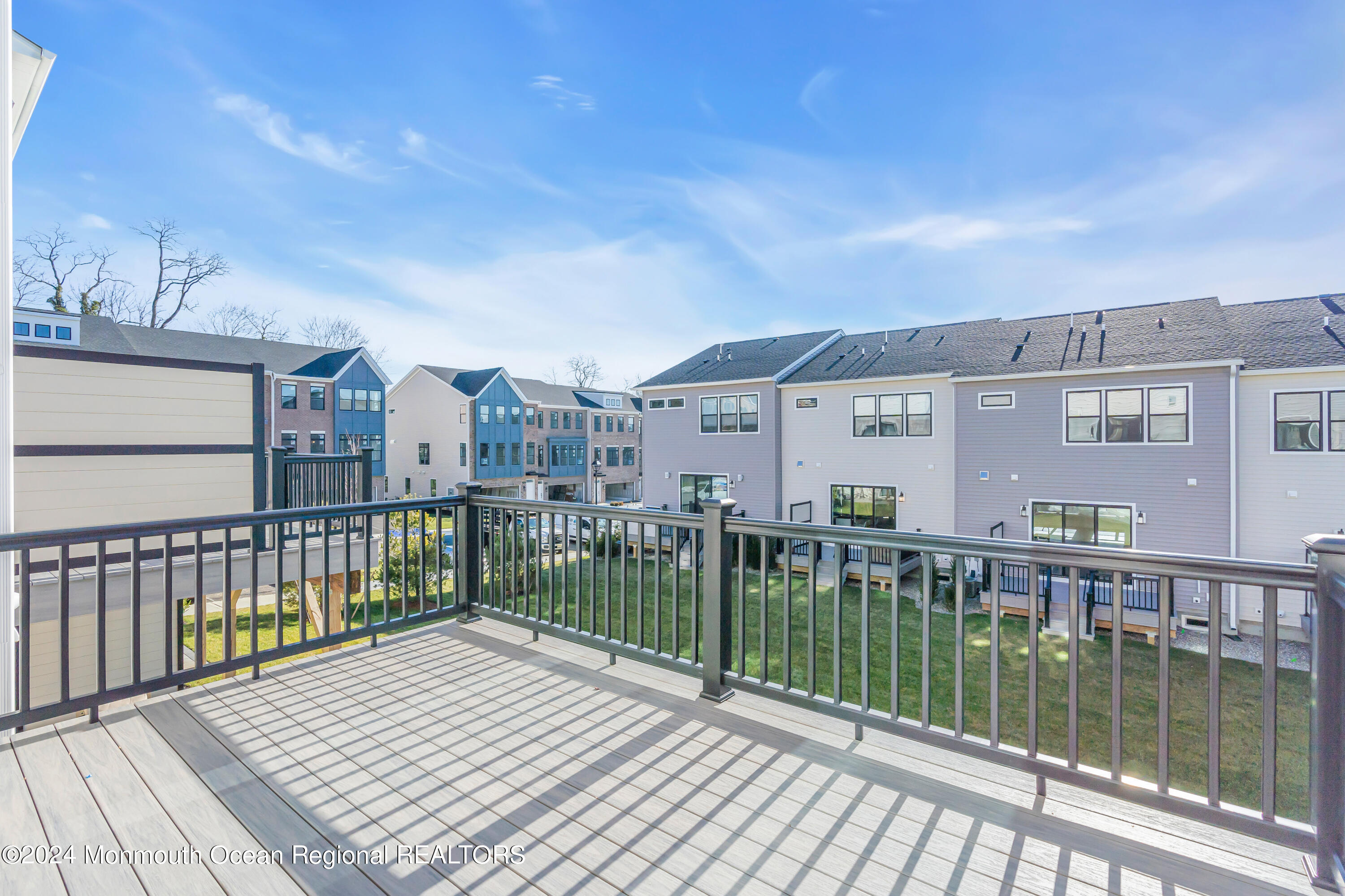 6 Augustus Drive Middletown, NJ 07748 - Photo 28 of 28 a view of a house with a wooden deck