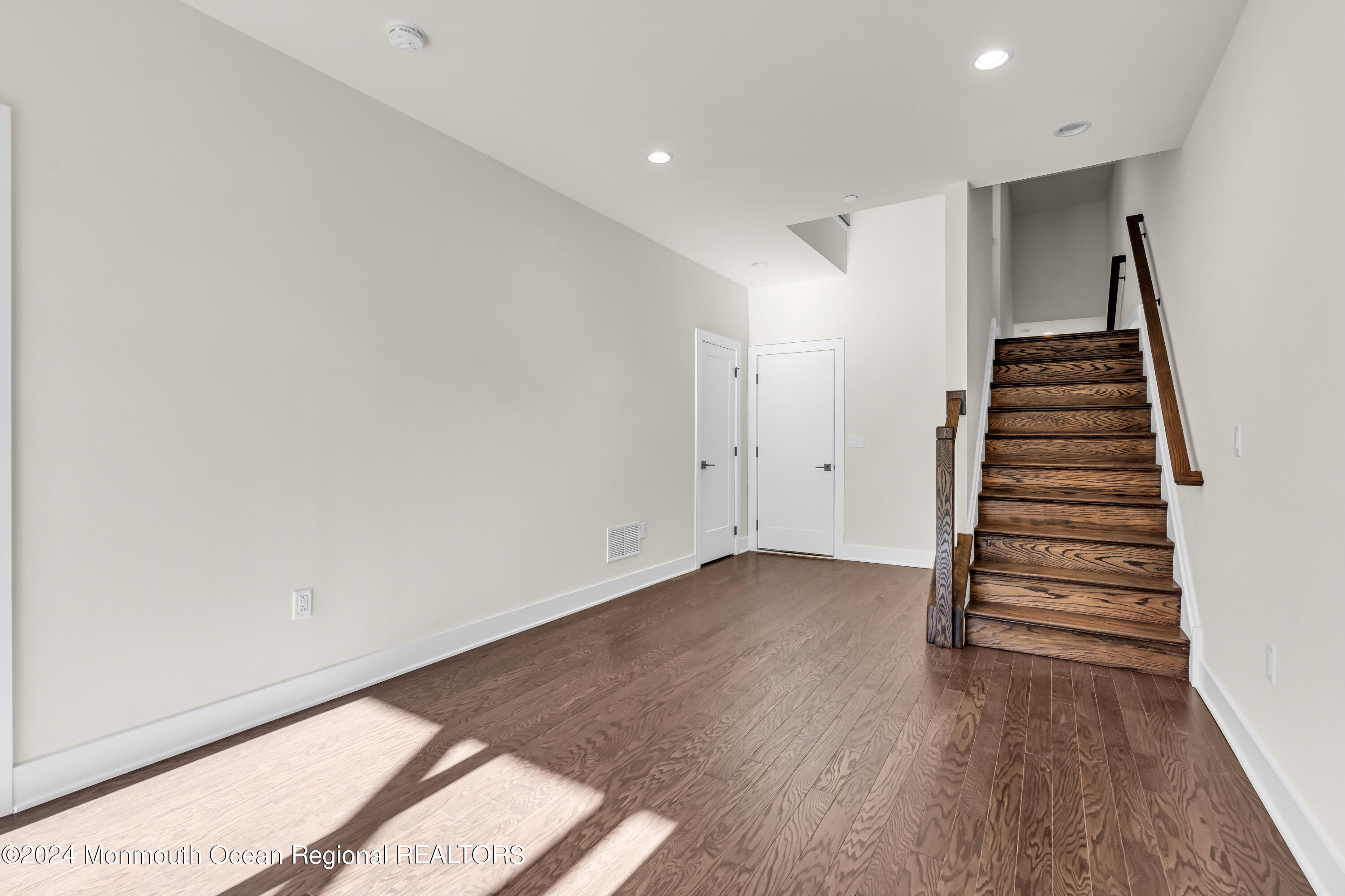 6 Augustus Drive Middletown, NJ 07748 - Photo 7 of 28 a view of entryway with wooden floor