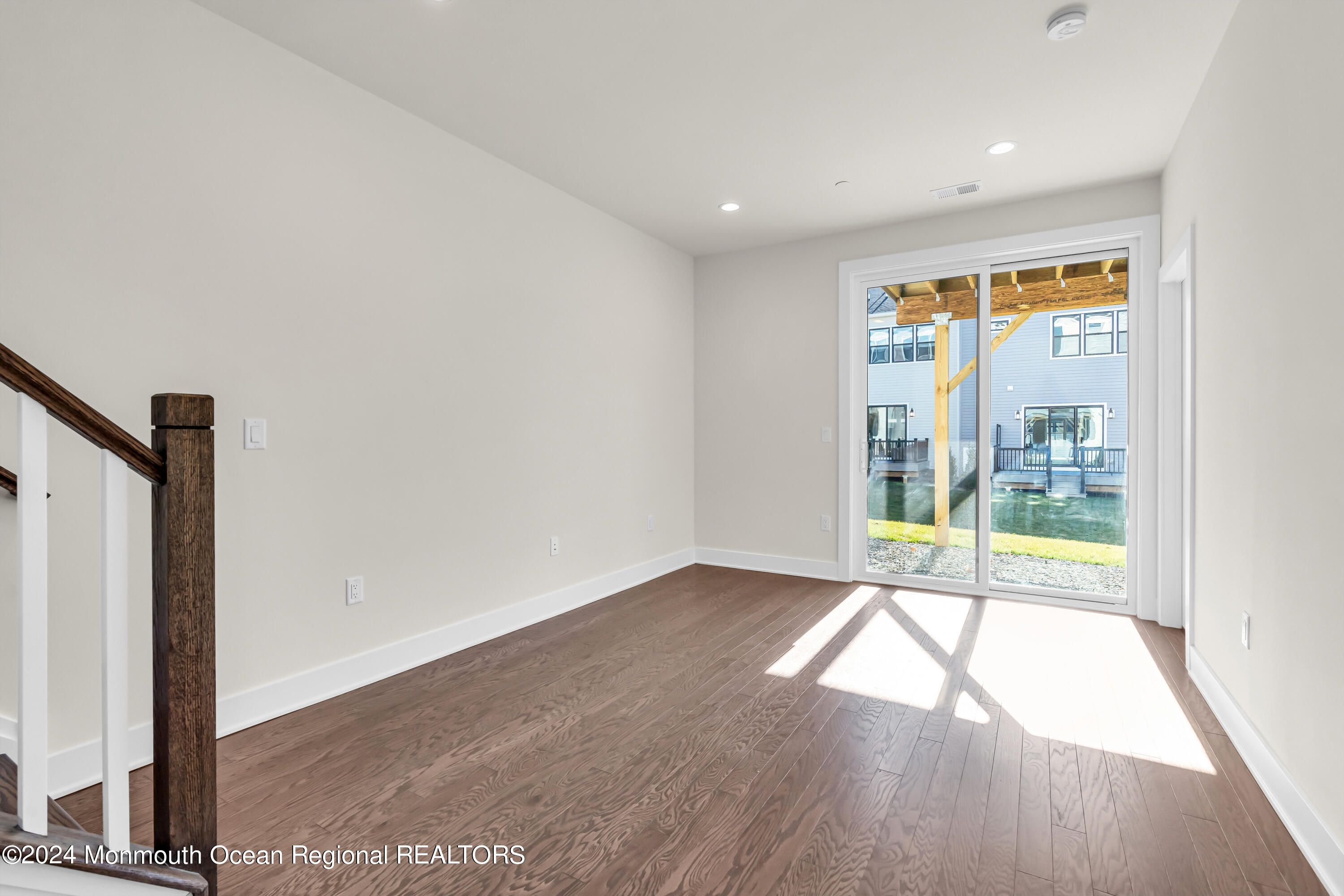 6 Augustus Drive Middletown, NJ 07748 - Photo 8 of 28 wooden floor in an empty room