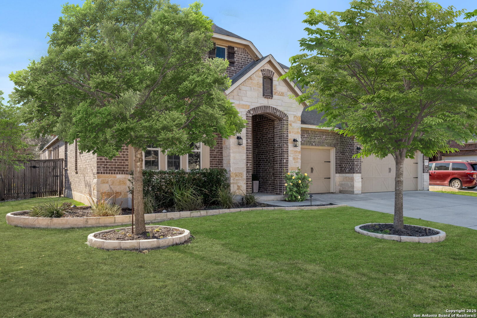 28827 Pfeiffers Gate Fair Oaks Ranch, TX 78015 - Photo 2 of 36 a front view of a house with a yard
