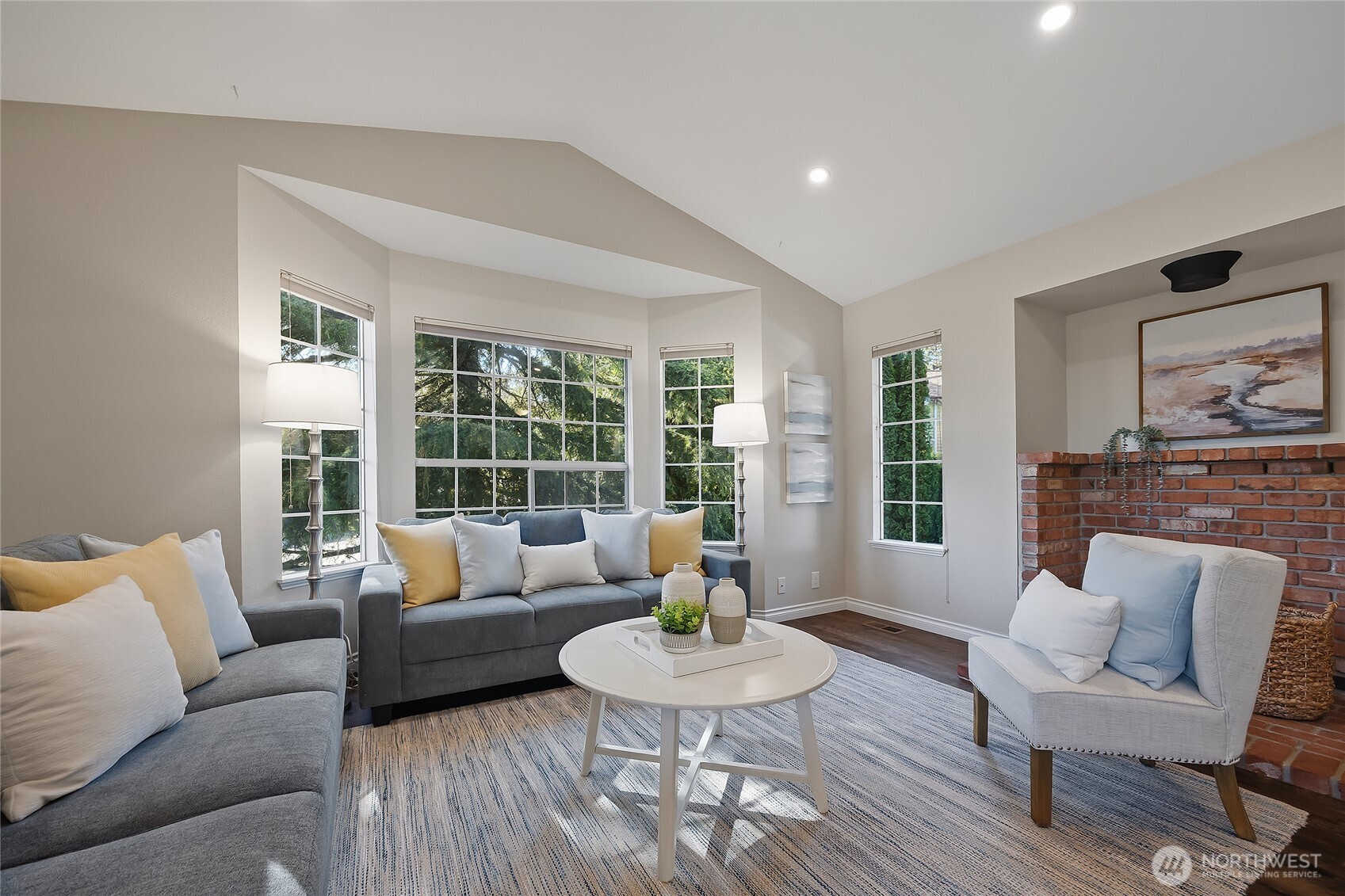 23707 Meridian Place West Bothell, WA 98021 - Photo 5 of 40 a living room with furniture and a large window