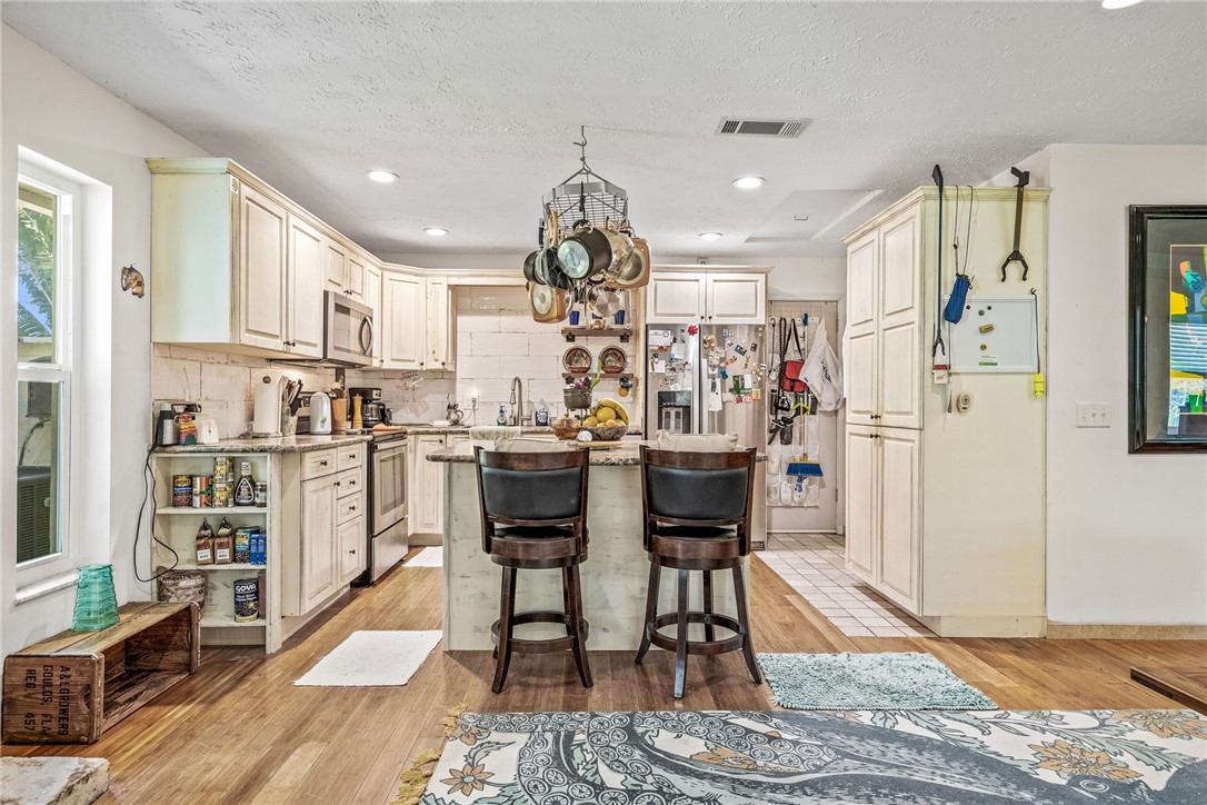 5313 Palm Drive Fort Pierce, FL 34982 - Photo 11 of 36 a view of a dining room with furniture