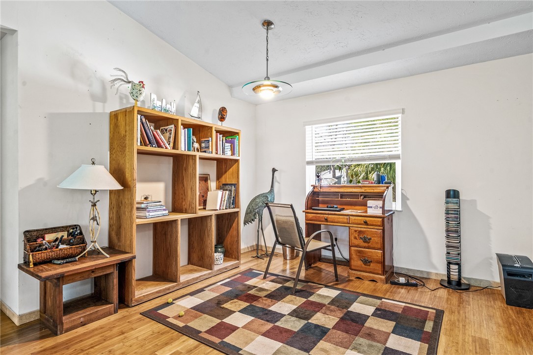 5313 Palm Drive Fort Pierce, FL 34982 - Photo 20 of 36 a view of a workspace with furniture and a window