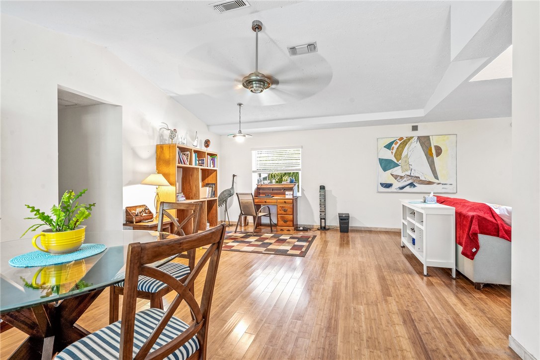5313 Palm Drive Fort Pierce, FL 34982 - Photo 22 of 36 a living room with furniture and wooden floor