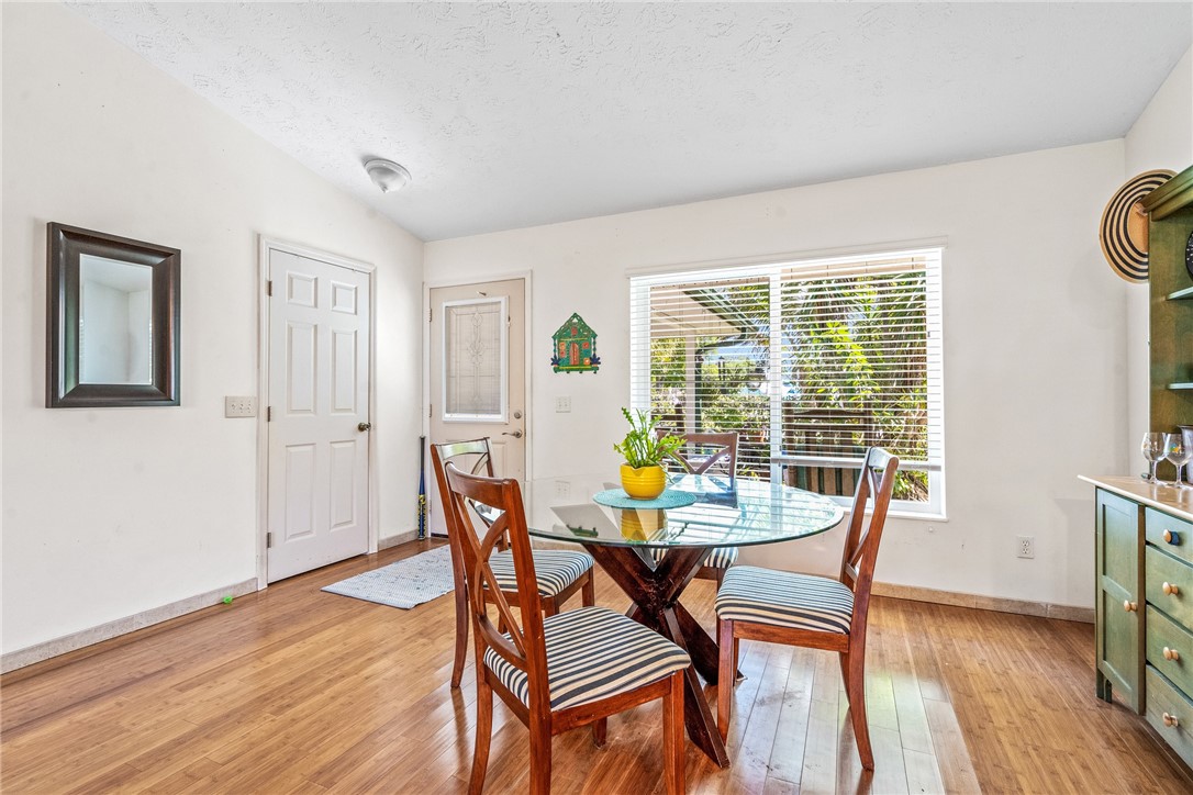 5313 Palm Drive Fort Pierce, FL 34982 - Photo 23 of 36 a view of a dining room with furniture and wooden floor