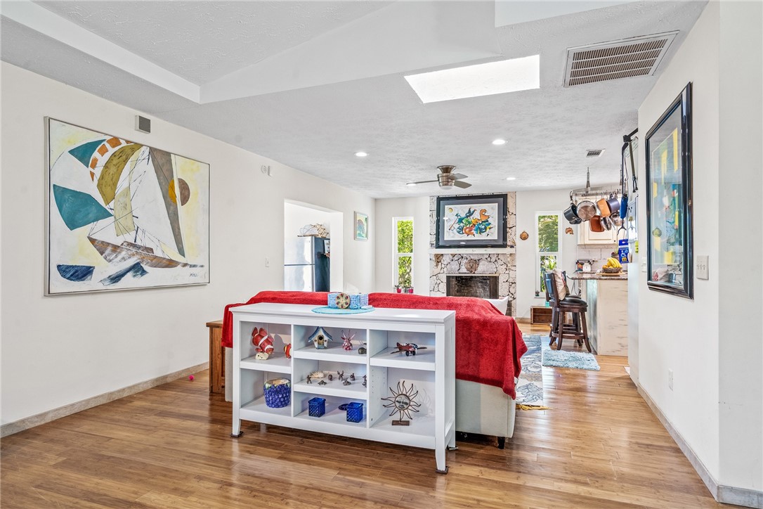 5313 Palm Drive Fort Pierce, FL 34982 - Photo 4 of 36 a living room with fireplace furniture and a wooden floor