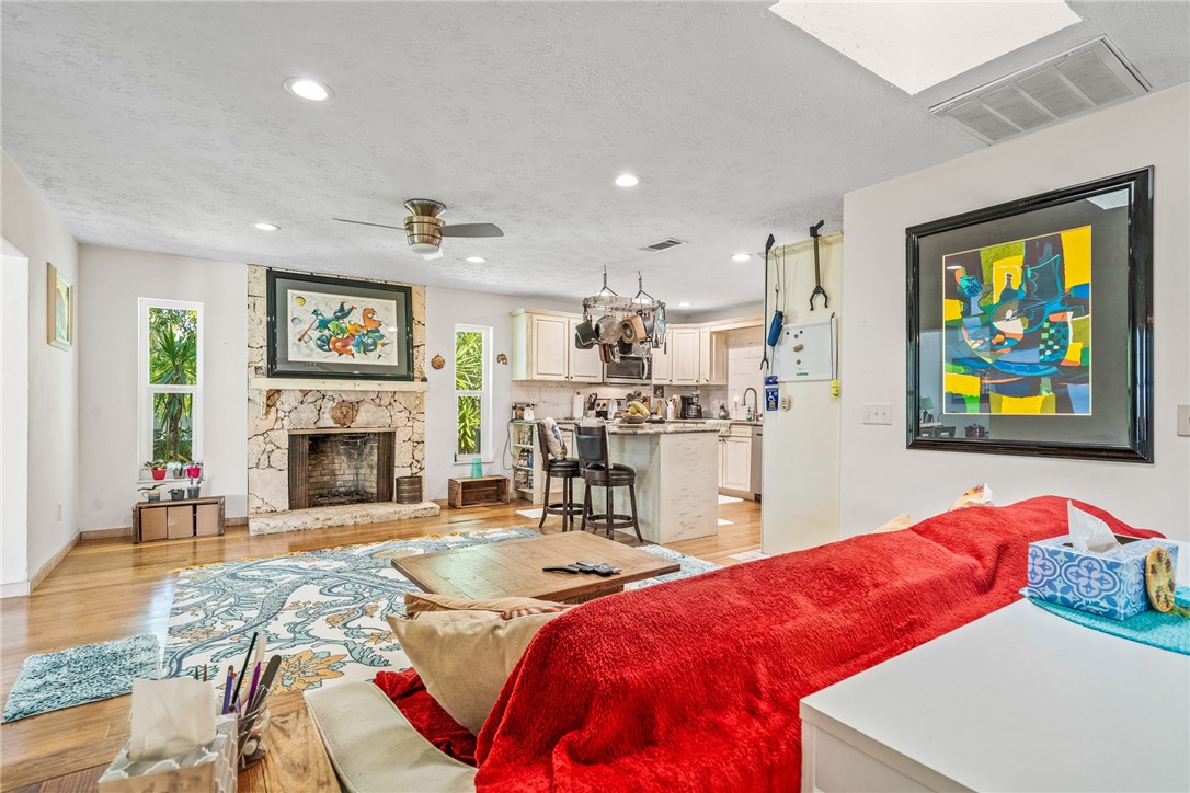 5313 Palm Drive Fort Pierce, FL 34982 - Photo 7 of 36 a living room with fireplace furniture and a fireplace