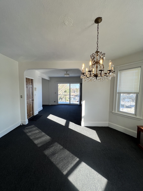 8 Irma Avenue, Unit 2 Watertown, MA 02472 - Photo 18 of 20 a very nice looking room with windows