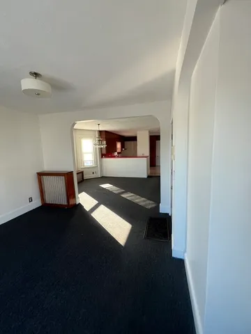 a view of an empty room and window