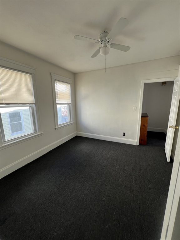 8 Irma Avenue, Unit 2 Watertown, MA 02472 - Photo 9 of 20 a view of an empty room with a window
