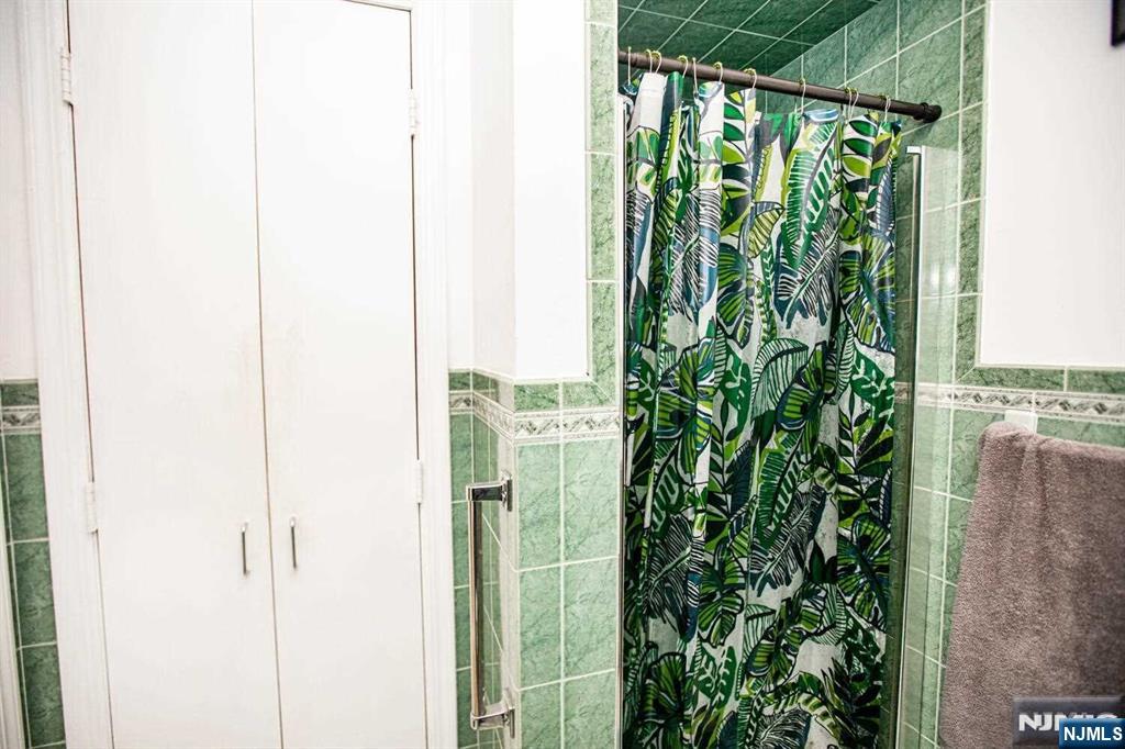 14 Green Court Lodi, NJ 07644 - Photo 7 of 7 a close view of a backyard of the house