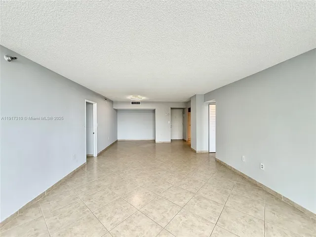 an empty room with a natural light