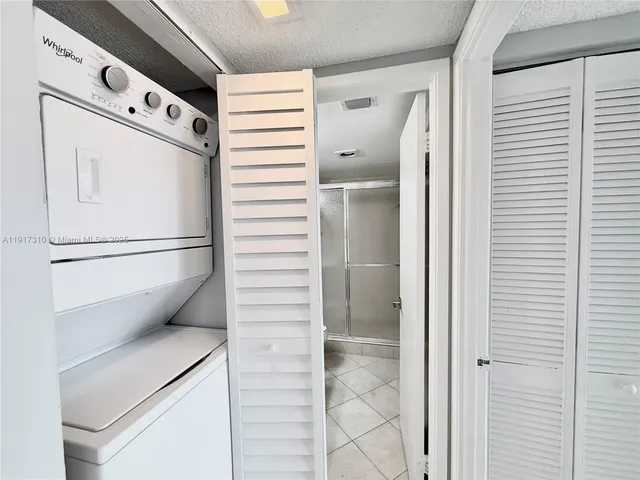 a large bathroom with a large tub and shower
