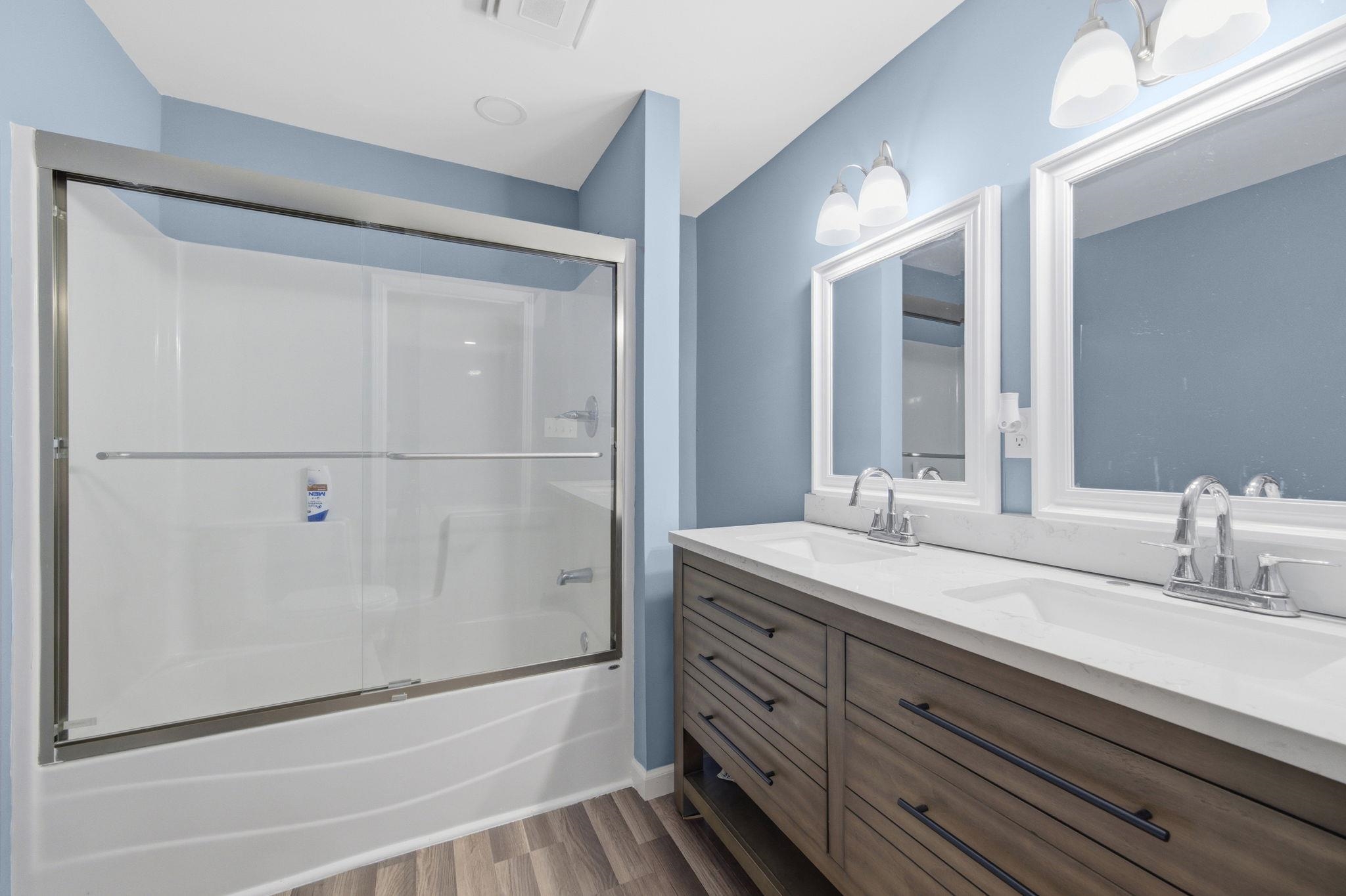 9509 Merrill Road Millington, TN 38053 - Photo 17 of 26 a bathroom with a granite countertop sink mirror and