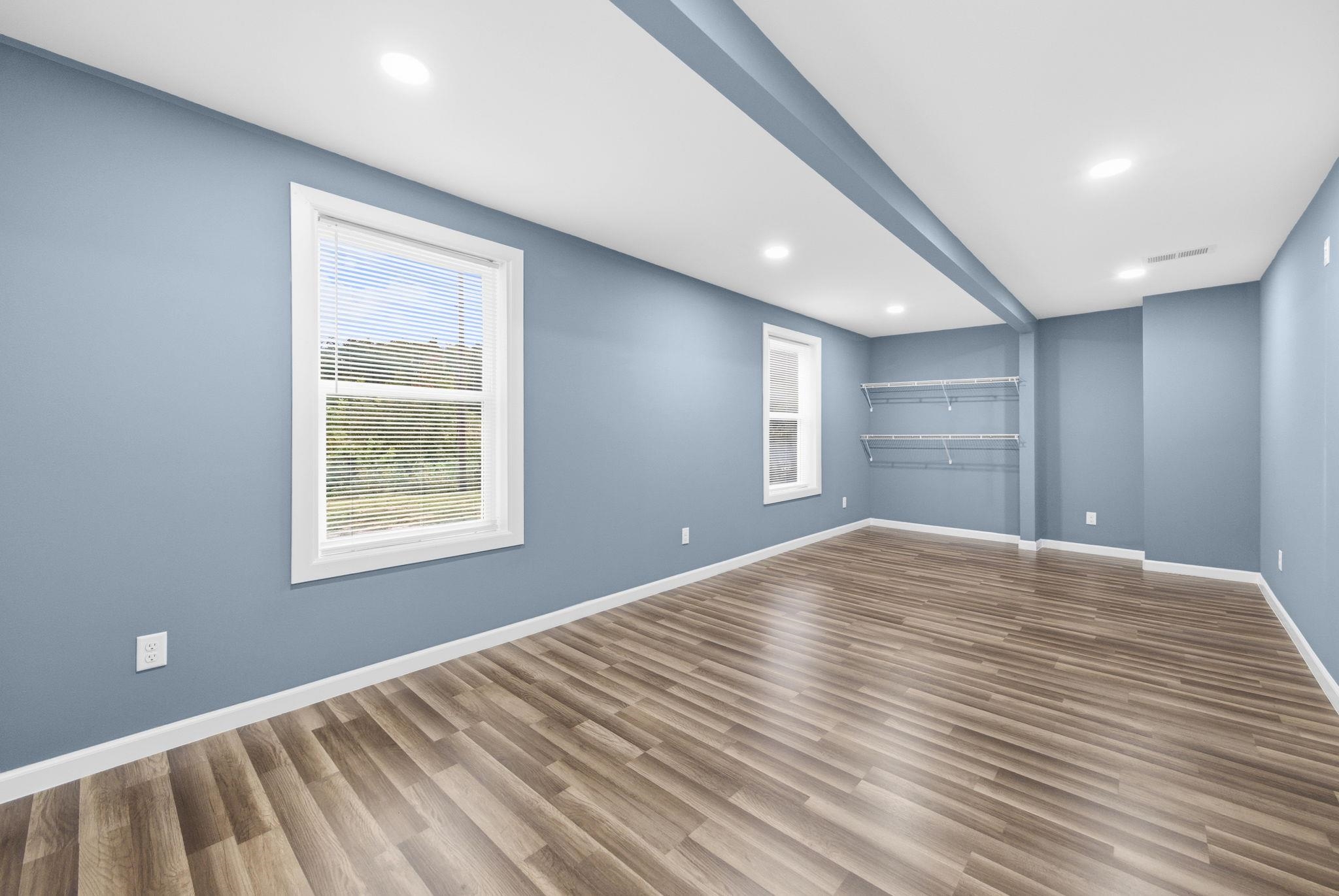 9509 Merrill Road Millington, TN 38053 - Photo 20 of 26 a view of empty room with wooden floor