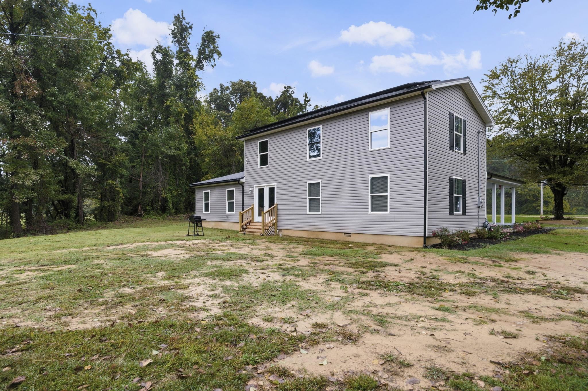 9509 Merrill Road Millington, TN 38053 - Photo 25 of 26 a view of a house with a yard