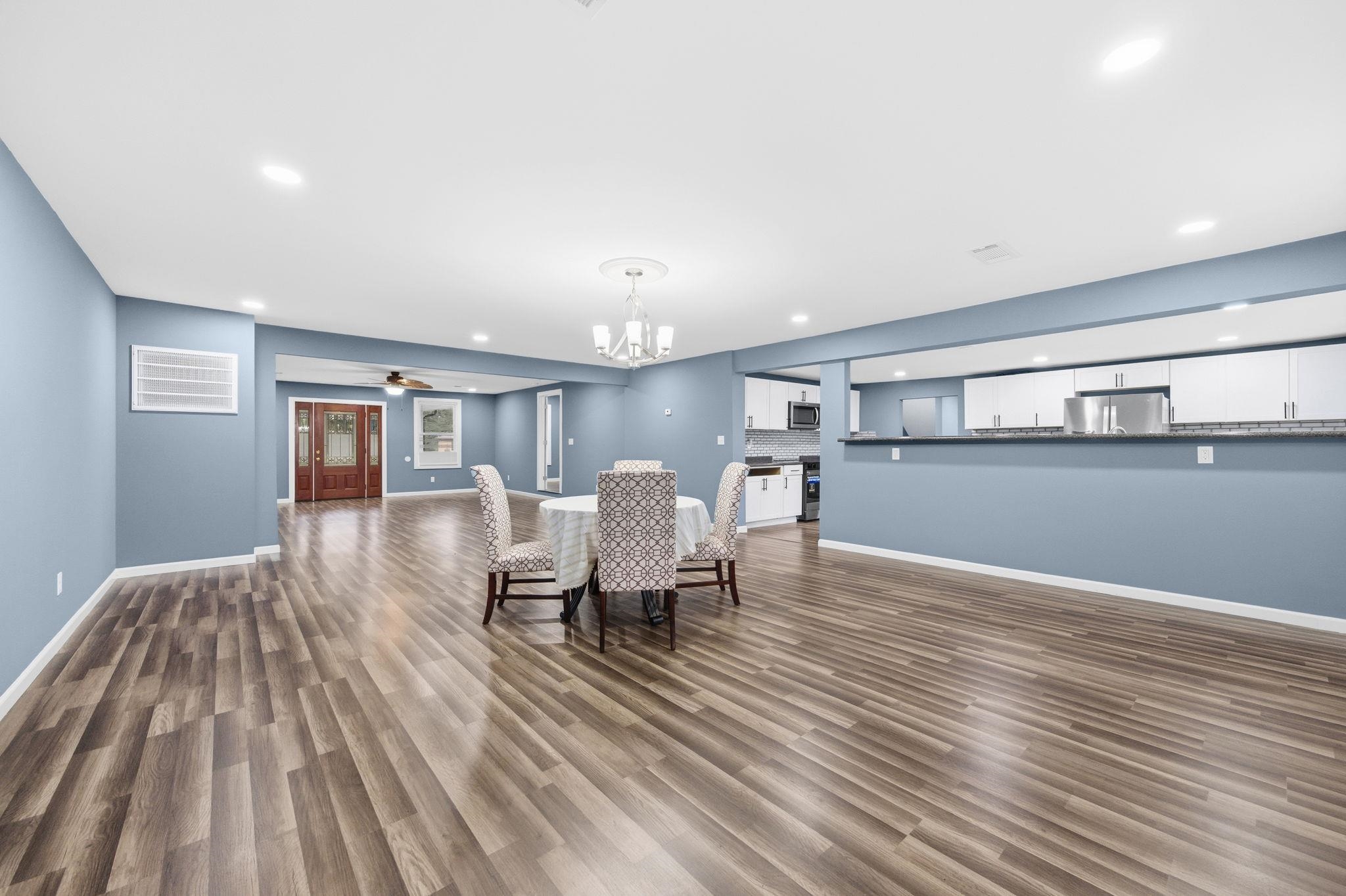 9509 Merrill Road Millington, TN 38053 - Photo 7 of 26 a living room with furniture and wooden floor