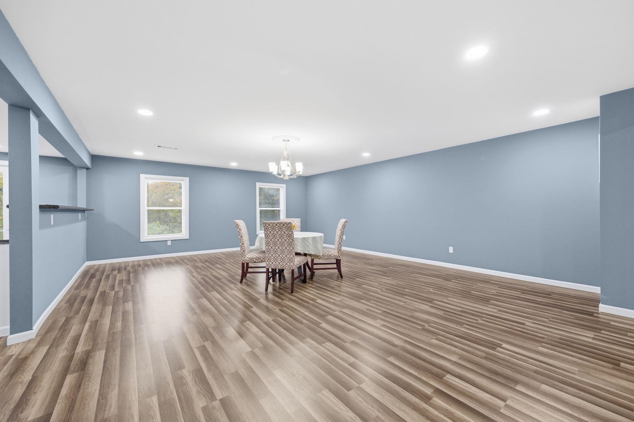 9509 Merrill Road Millington, TN 38053 - Photo 8 of 26 a view of dining room with furniture and wooden floor