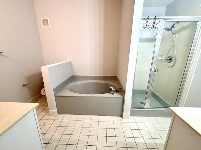 10520 Southwest Stephanie Way, Unit 2202 Port St. Lucie, FL 34987 - Photo 6 of 9 a bathroom with a bathtub and shower