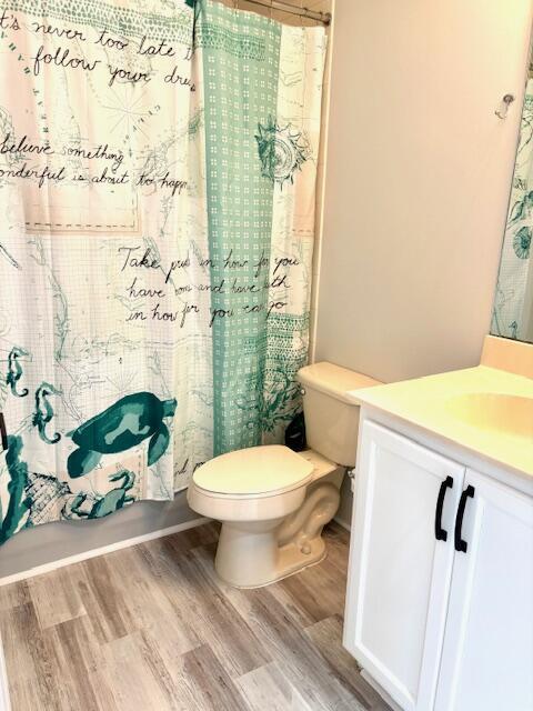 10520 Southwest Stephanie Way, Unit 2202 Port St. Lucie, FL 34987 - Photo 7 of 9 a bathroom with a sink and toilet