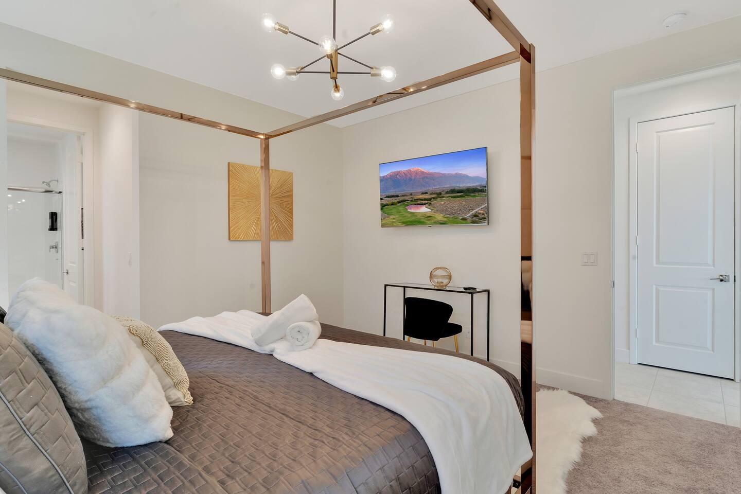 84635 Lago Brezza Drive Indio, CA 92203 - Photo 13 of 39 a bedroom with a bed and a painting on the wall