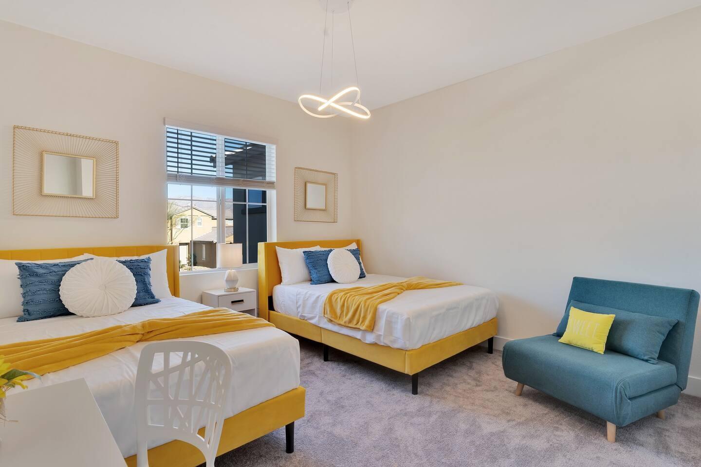 84635 Lago Brezza Drive Indio, CA 92203 - Photo 18 of 39 a bedroom with two beds and painted walls