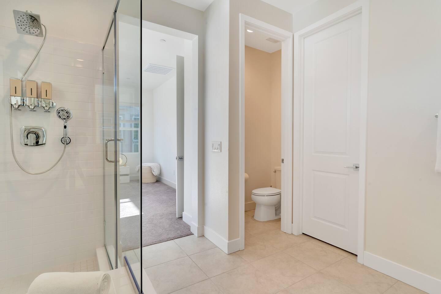 84635 Lago Brezza Drive Indio, CA 92203 - Photo 27 of 39 a bathroom with a granite countertop shower and a toilet