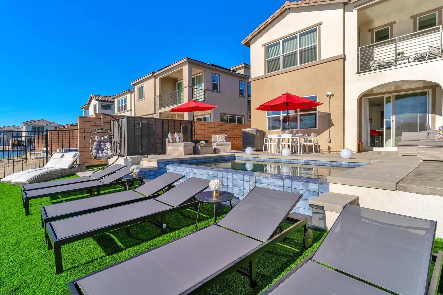 84635 Lago Brezza Drive Indio, CA 92203 - Photo 29 of 39 a front view of a house with a yard table and chairs