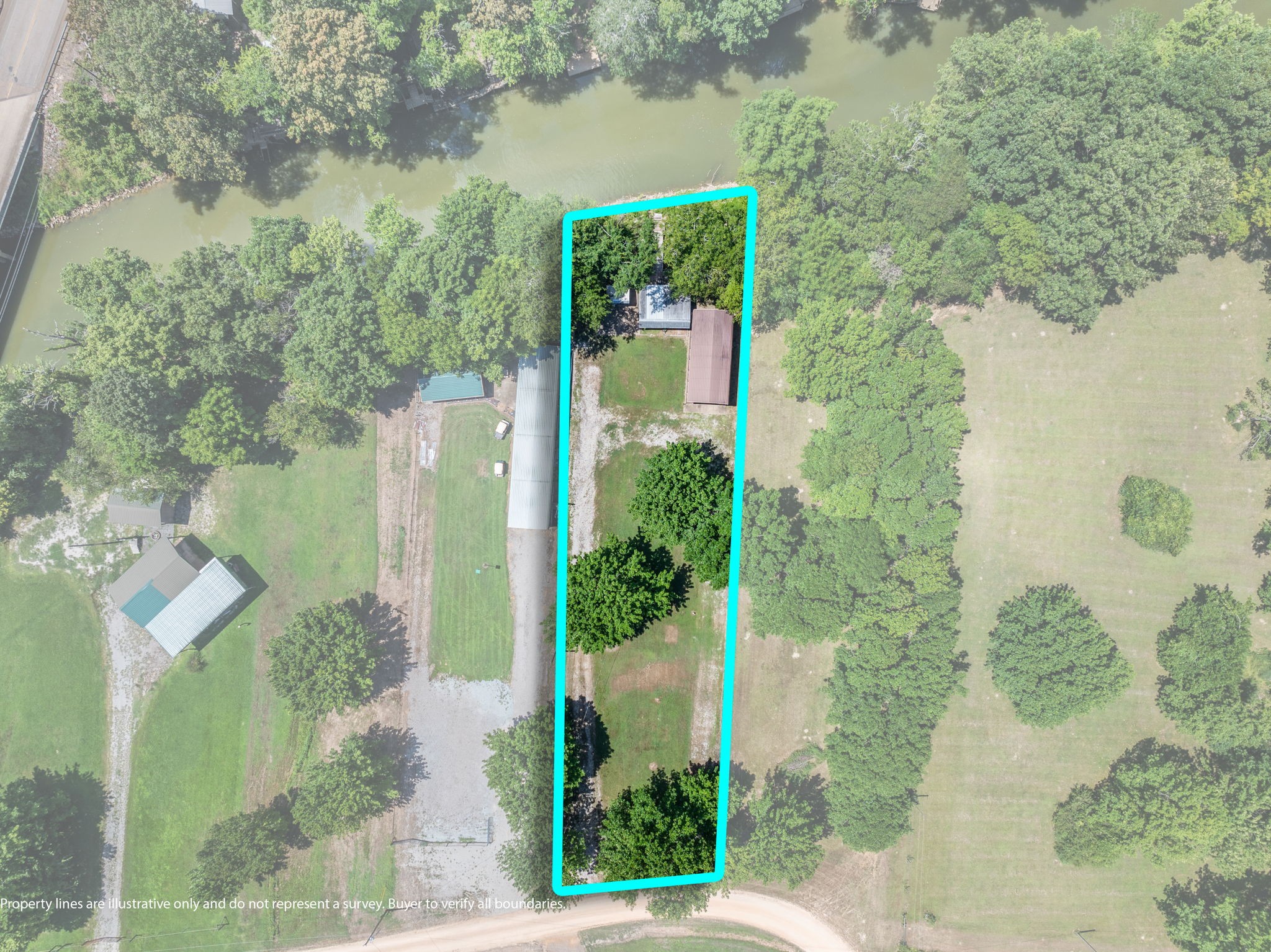 85 Bargeview Lane Adamsville, TN 38310 - Photo 1 of 44 a front view of a house with a yard