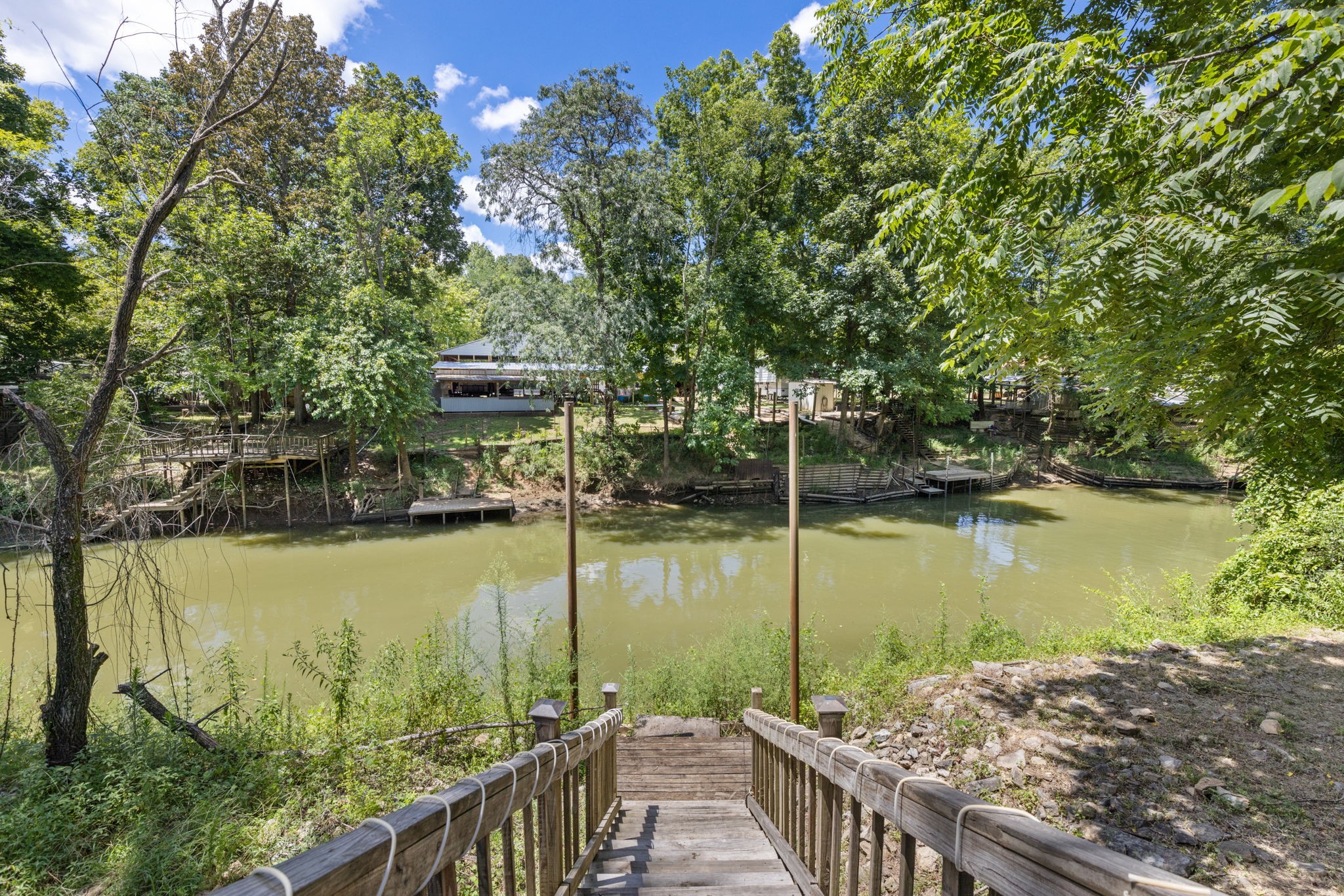 85 Bargeview Lane Adamsville, TN 38310 - Photo 11 of 44 a view of a lake from a balcony