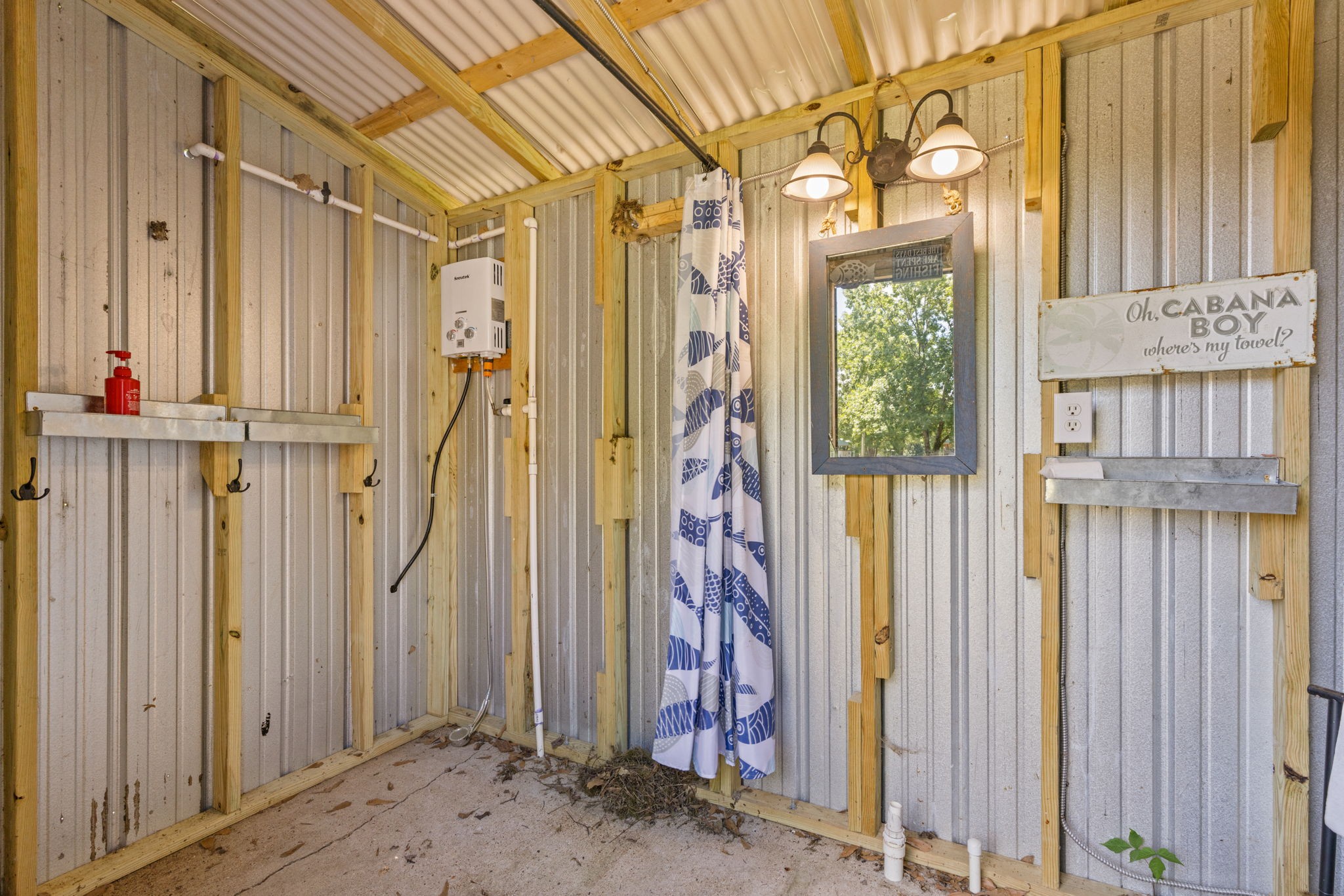 85 Bargeview Lane Adamsville, TN 38310 - Photo 14 of 44 a view of a house with a wooden fence
