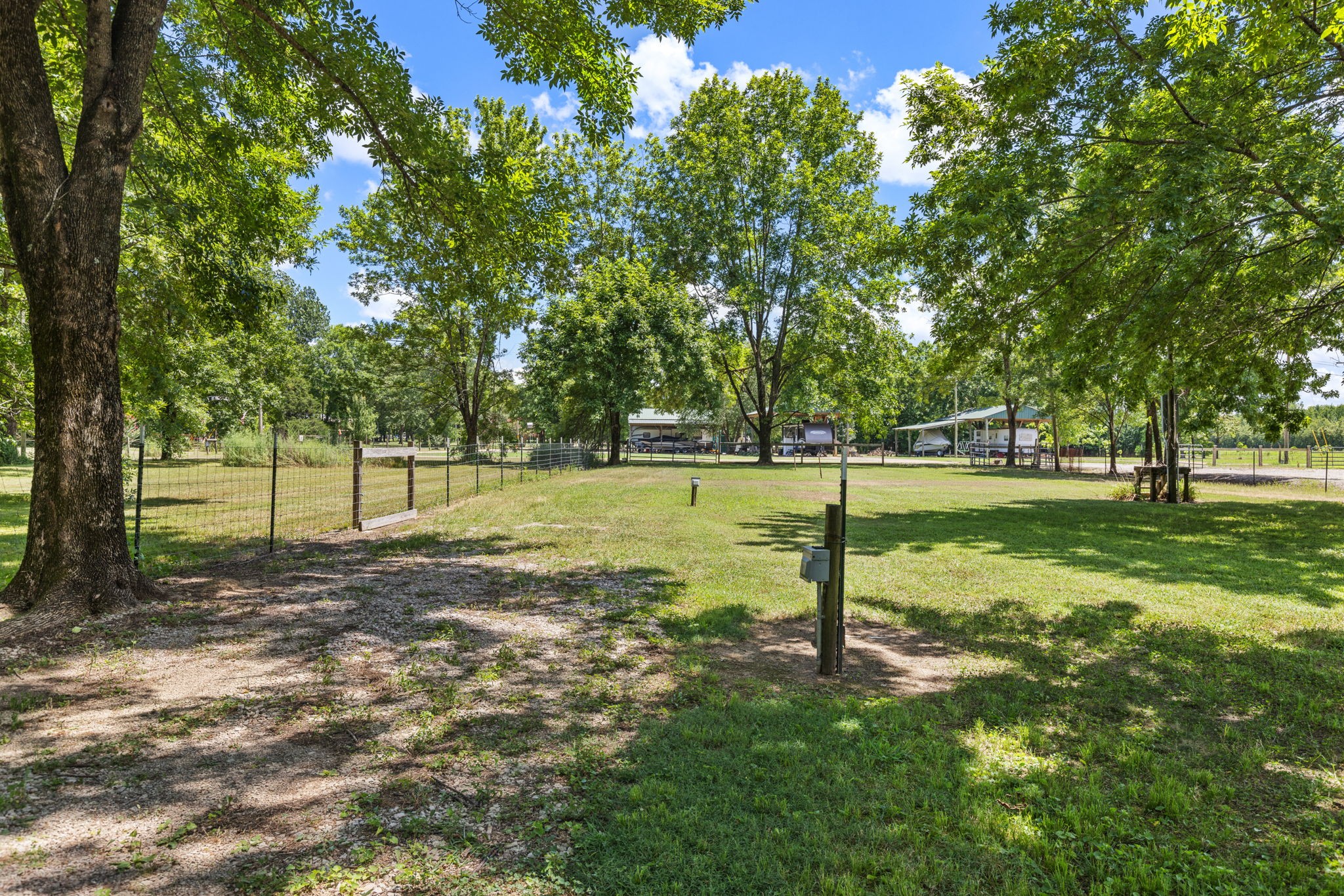 85 Bargeview Lane Adamsville, TN 38310 - Photo 19 of 44 a view of a park with trees