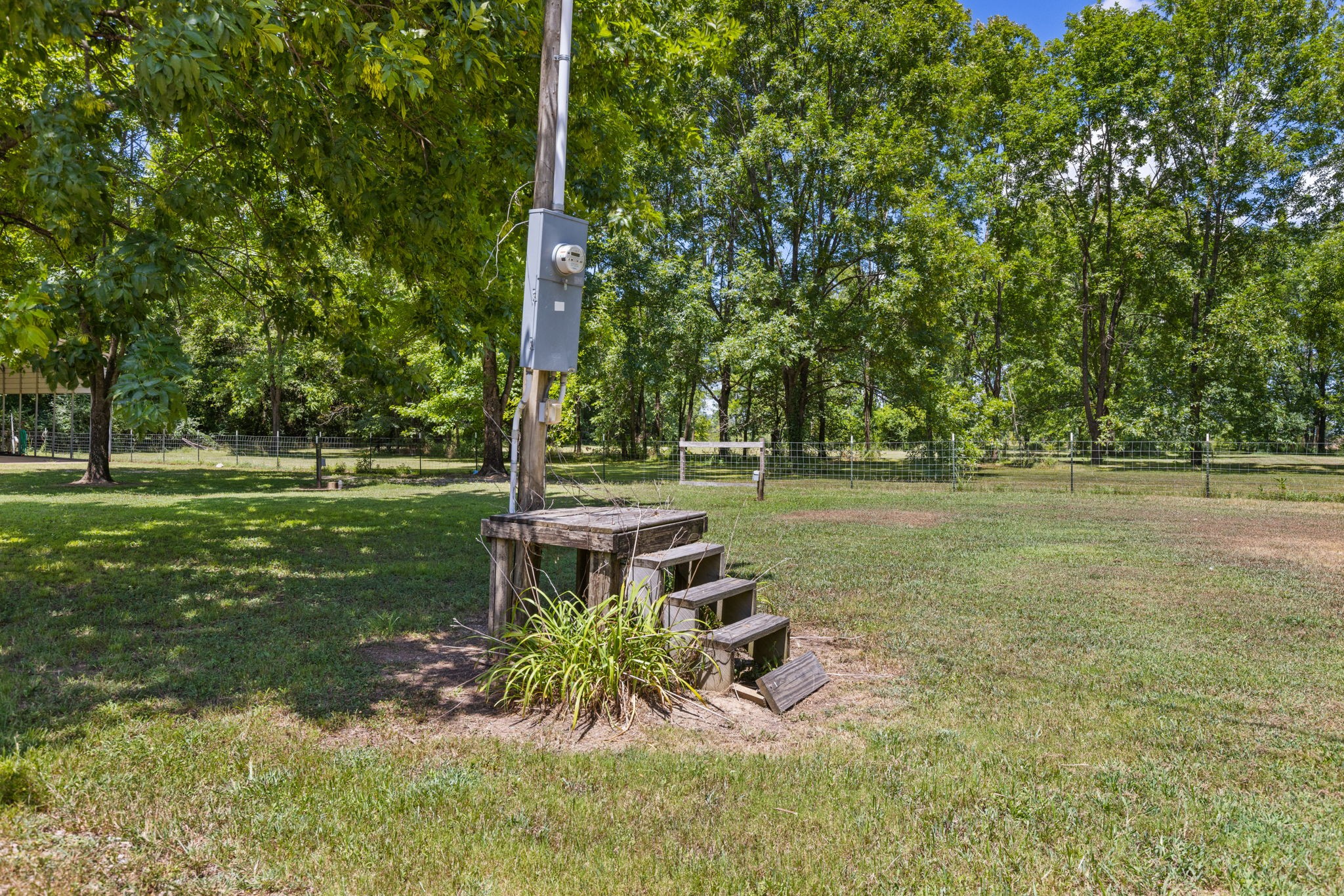 85 Bargeview Lane Adamsville, TN 38310 - Photo 20 of 44 a view of a yard with a bench