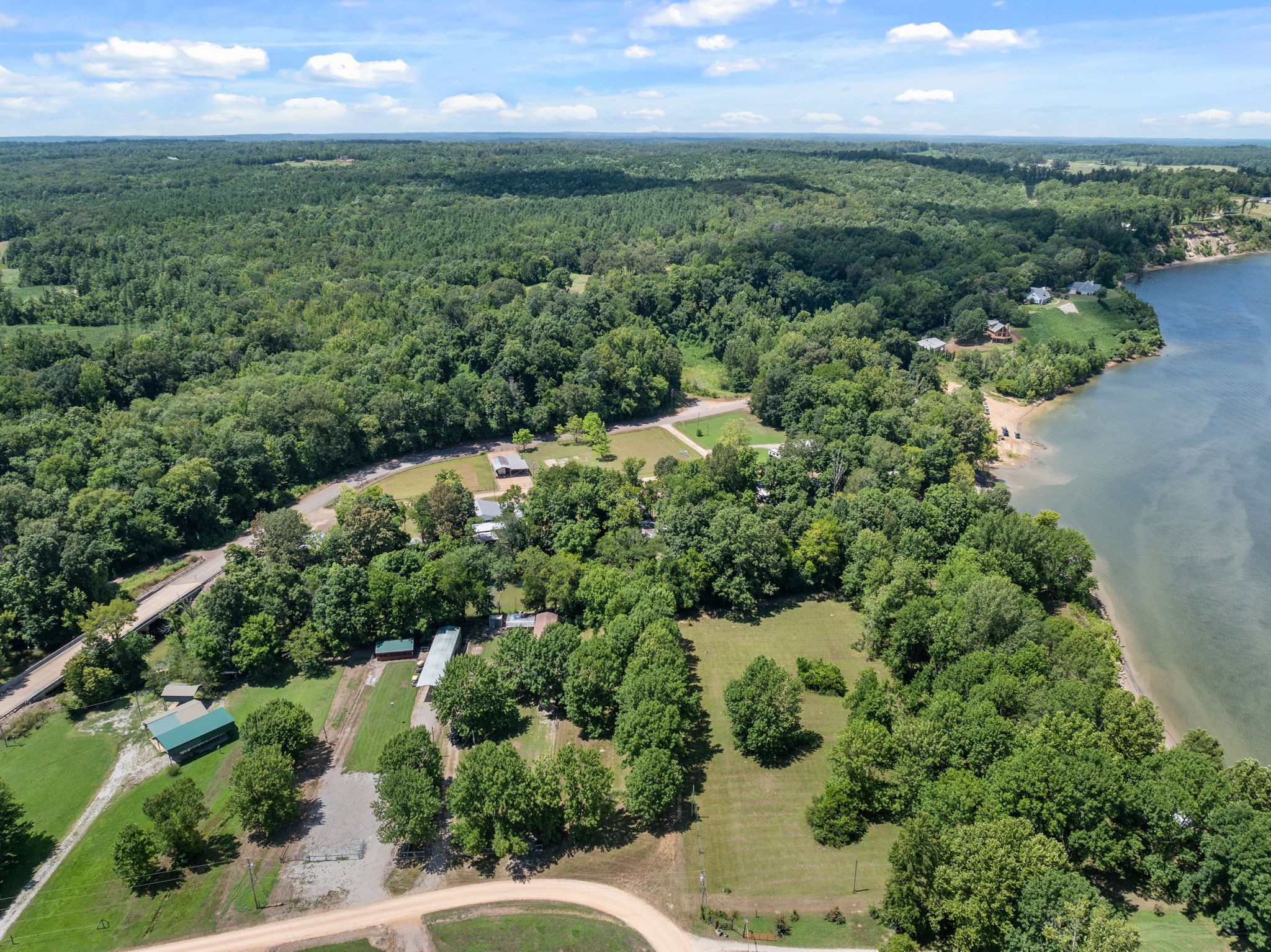 85 Bargeview Lane Adamsville, TN 38310 - Photo 27 of 44 an aerial view of a houses with a yard