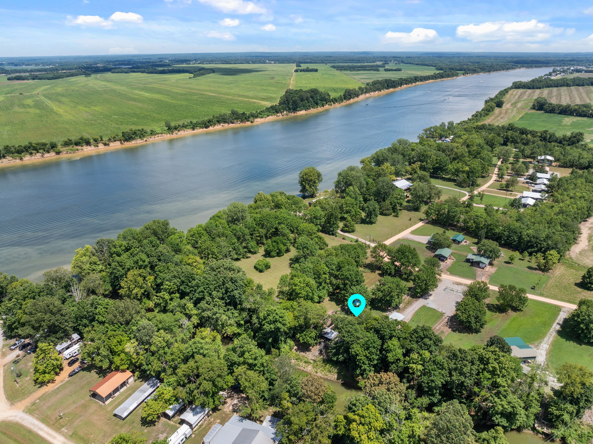 85 Bargeview Lane Adamsville, TN 38310 - Photo 30 of 44 an aerial view of a houses with a lake view