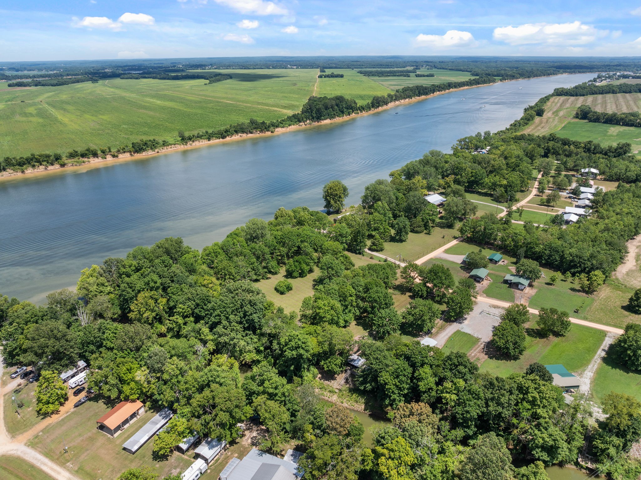 85 Bargeview Lane Adamsville, TN 38310 - Photo 31 of 44 an aerial view of a houses with a lake view