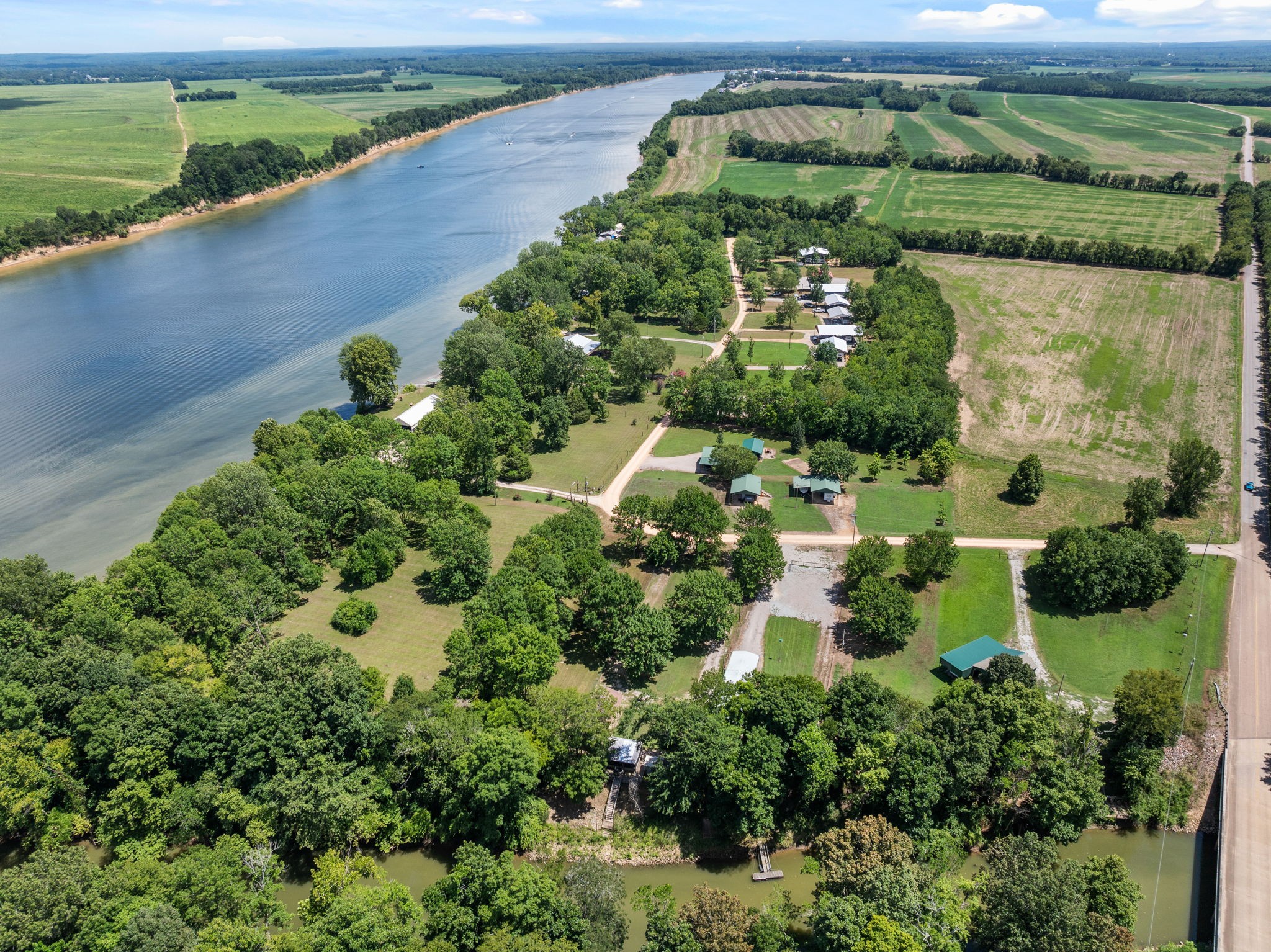 85 Bargeview Lane Adamsville, TN 38310 - Photo 33 of 44 an aerial view of a house with a yard and outdoor seating