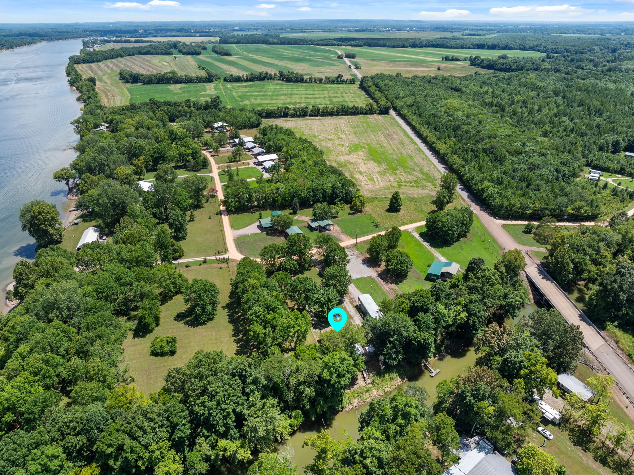 85 Bargeview Lane Adamsville, TN 38310 - Photo 34 of 44 an aerial view of a house with a yard
