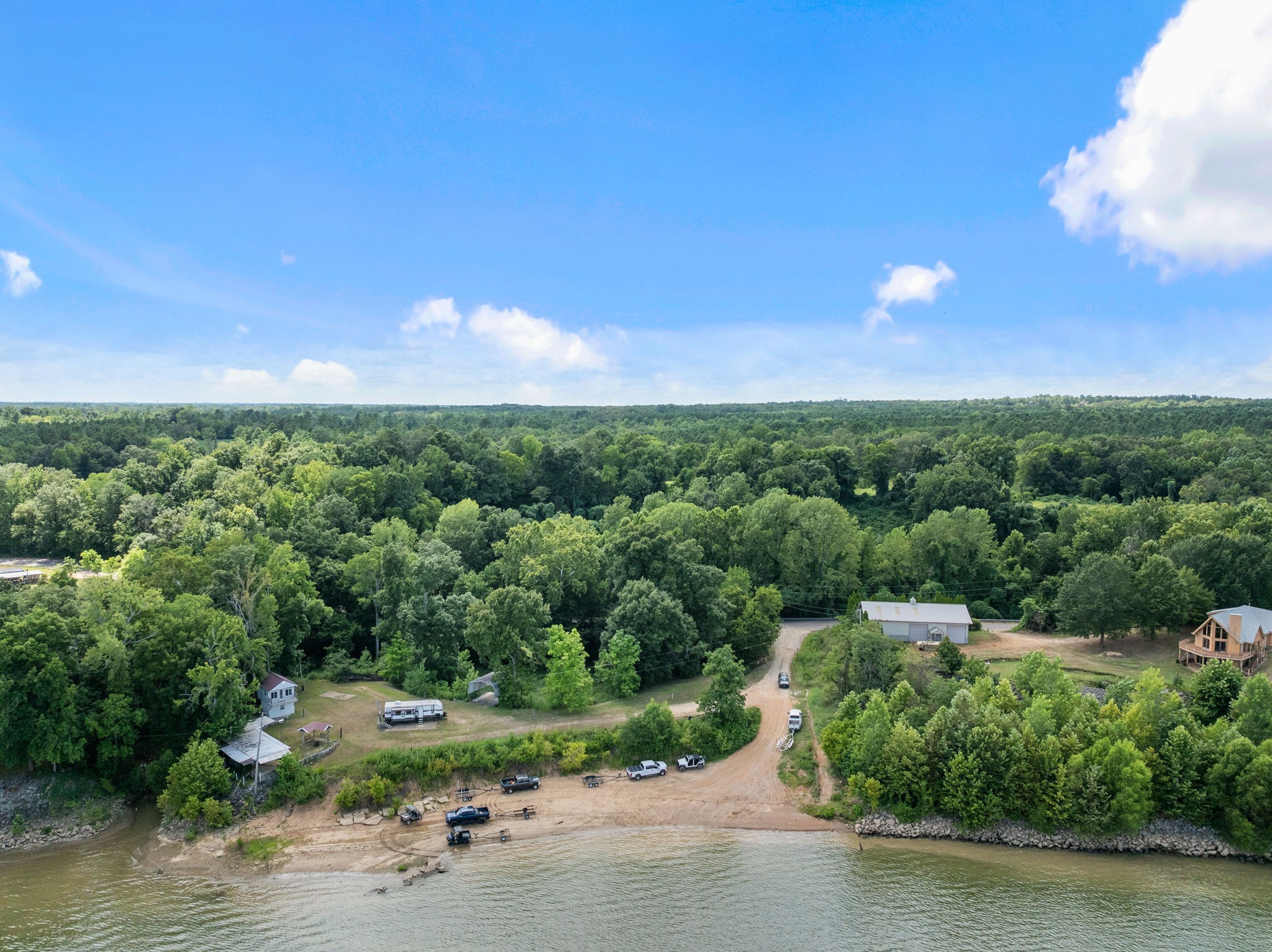 85 Bargeview Lane Adamsville, TN 38310 - Photo 41 of 44 an aerial view of a houses with yard and lake view