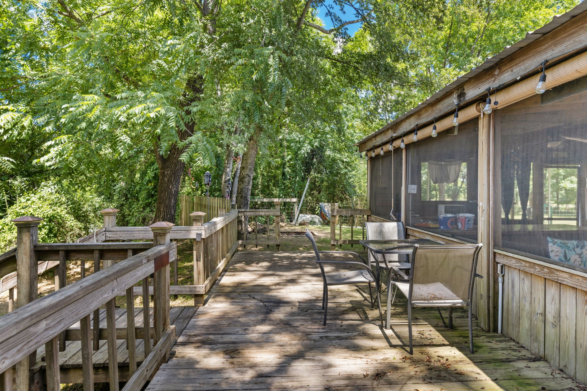 85 Bargeview Lane Adamsville, TN 38310 - Photo 9 of 44 a view of a chair and tables in the balcony
